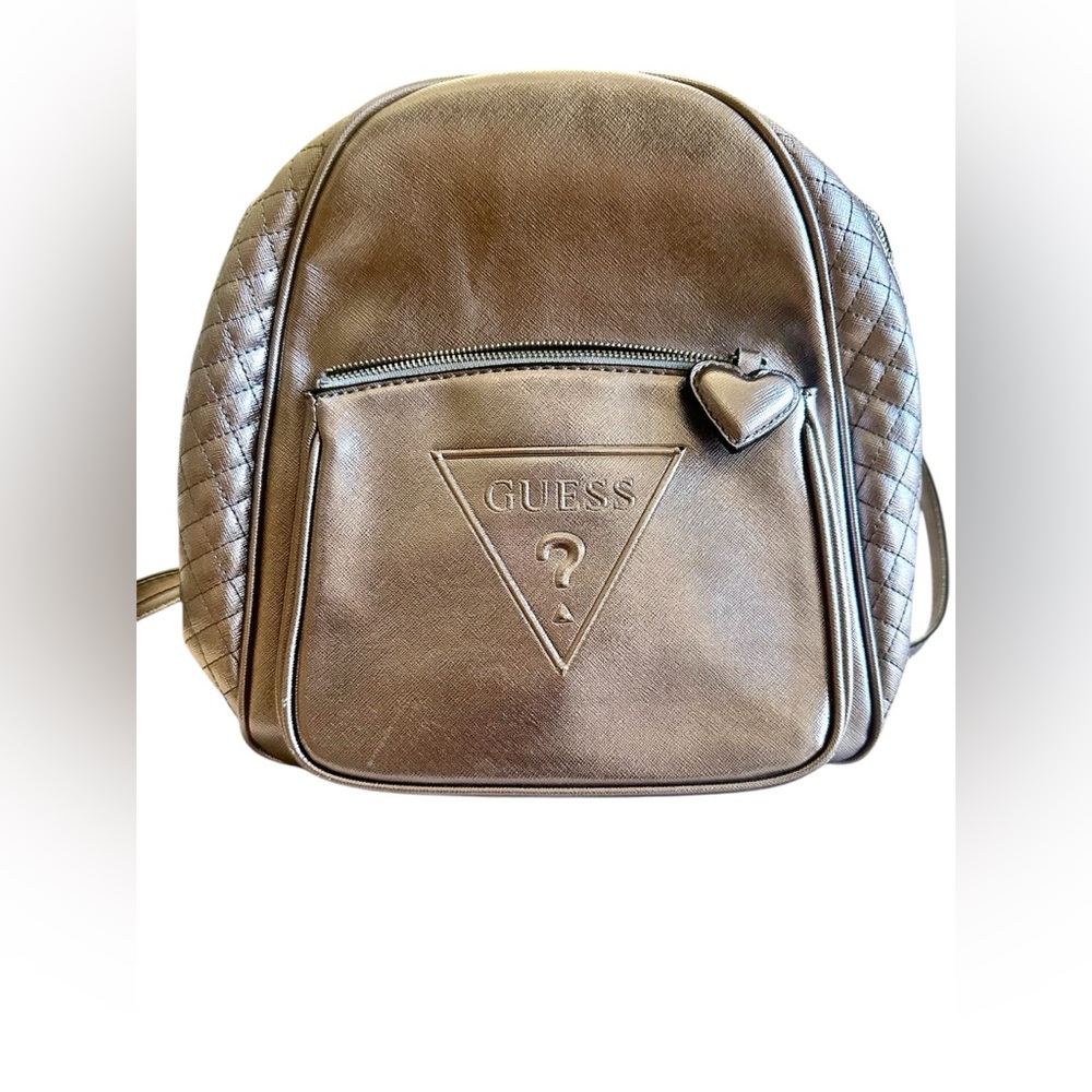 GUESS silver metallic color Backpack with front zipper pocket.